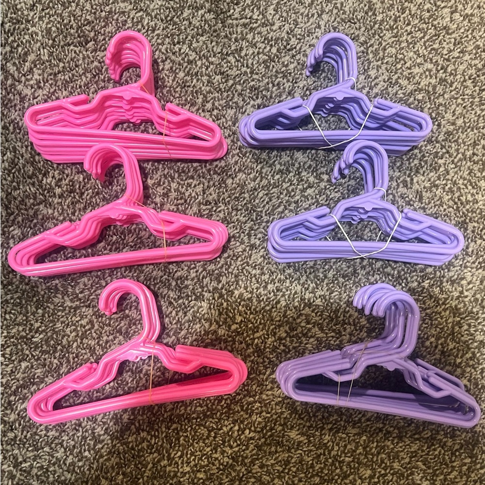 Set of Pink and Purple Plastic Hangers